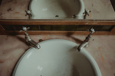 High angle view of faucet in bathroom