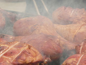 Close-up of meat cooking on barbecue grill