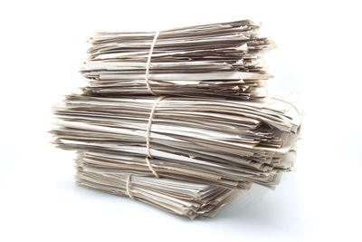 Close-up of stack against white background