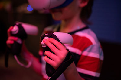 Vr game and virtual reality. kid boy gamer six years old fun playing on futuristic simulation video