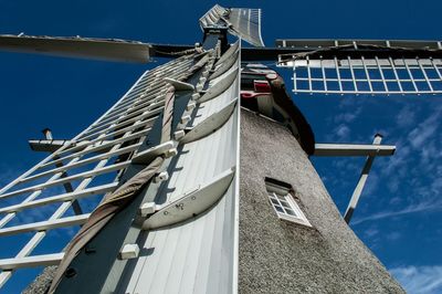 Low angle view of built structure against blue sky