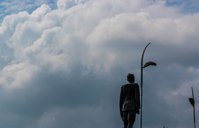 Low angle view of sculpture against sky