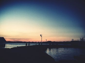 Scenic view of sea at sunset