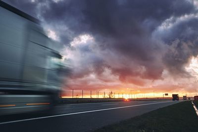 View of road against cloudy sky