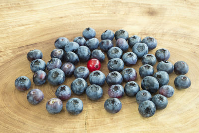 High angle view of blueberries on table