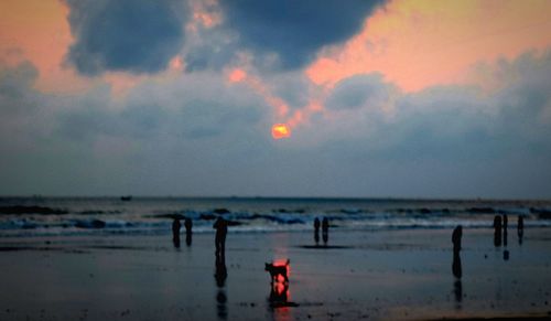 Scenic view of sea against sky at sunset