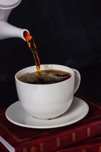 Close-up of coffee cup on table