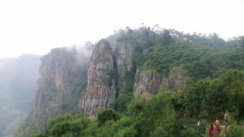 Panoramic view of trees on mountain against sky