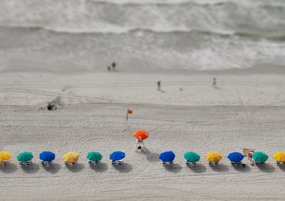 Multi colored umbrellas on beach