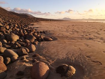 Scenic view of beach against sky