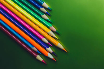 High angle view of colored pencils on table