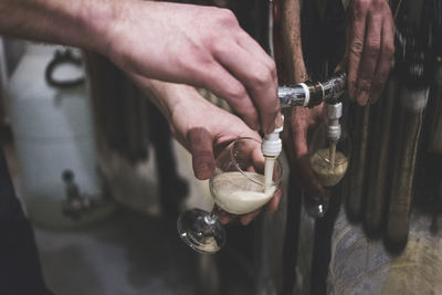 Close-up of man holding drink