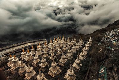 High angle view of historical building against cloudy sky