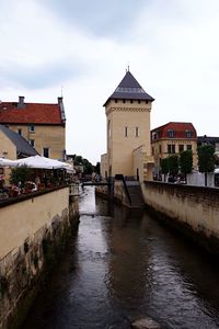 View of canal along buildings