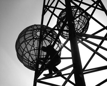 Low angle view of ferris wheel against sky