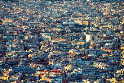 High angle view of illuminated buildings in city