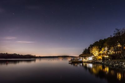 Reflection of trees in calm lake