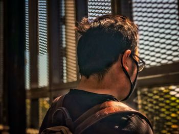 Rear view portrait of man gazing out