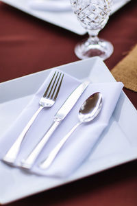 High angle view of fork on table