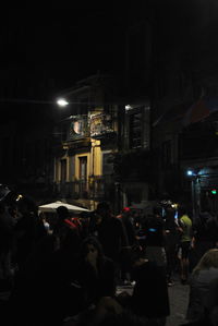 Crowd in city at night