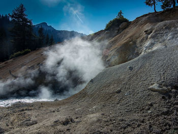 Scenic view of volcanic landscape against sky