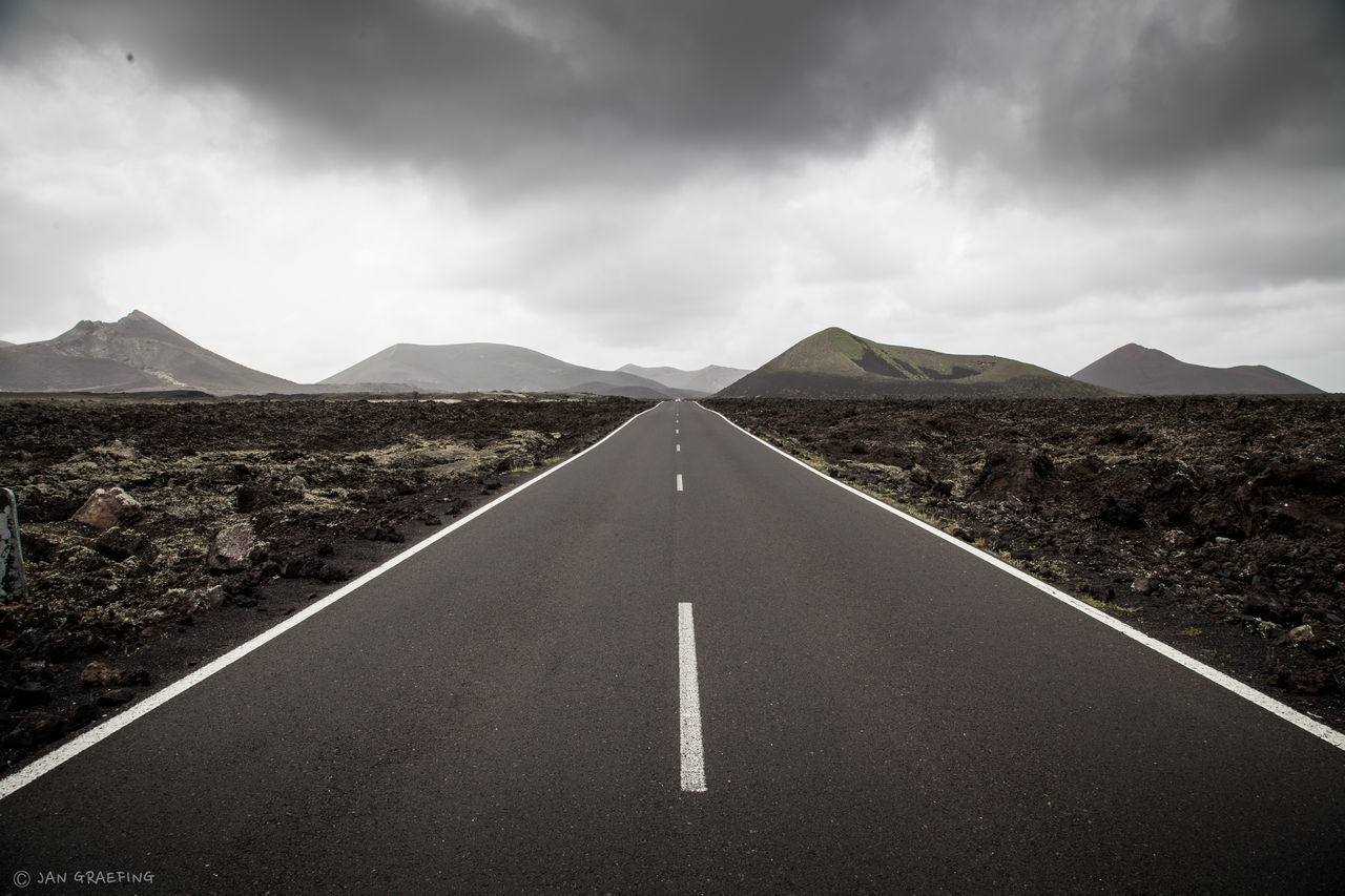 VIEW OF ROAD ALONG LANDSCAPE