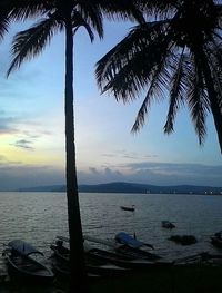 Scenic view of sea against sky at sunset