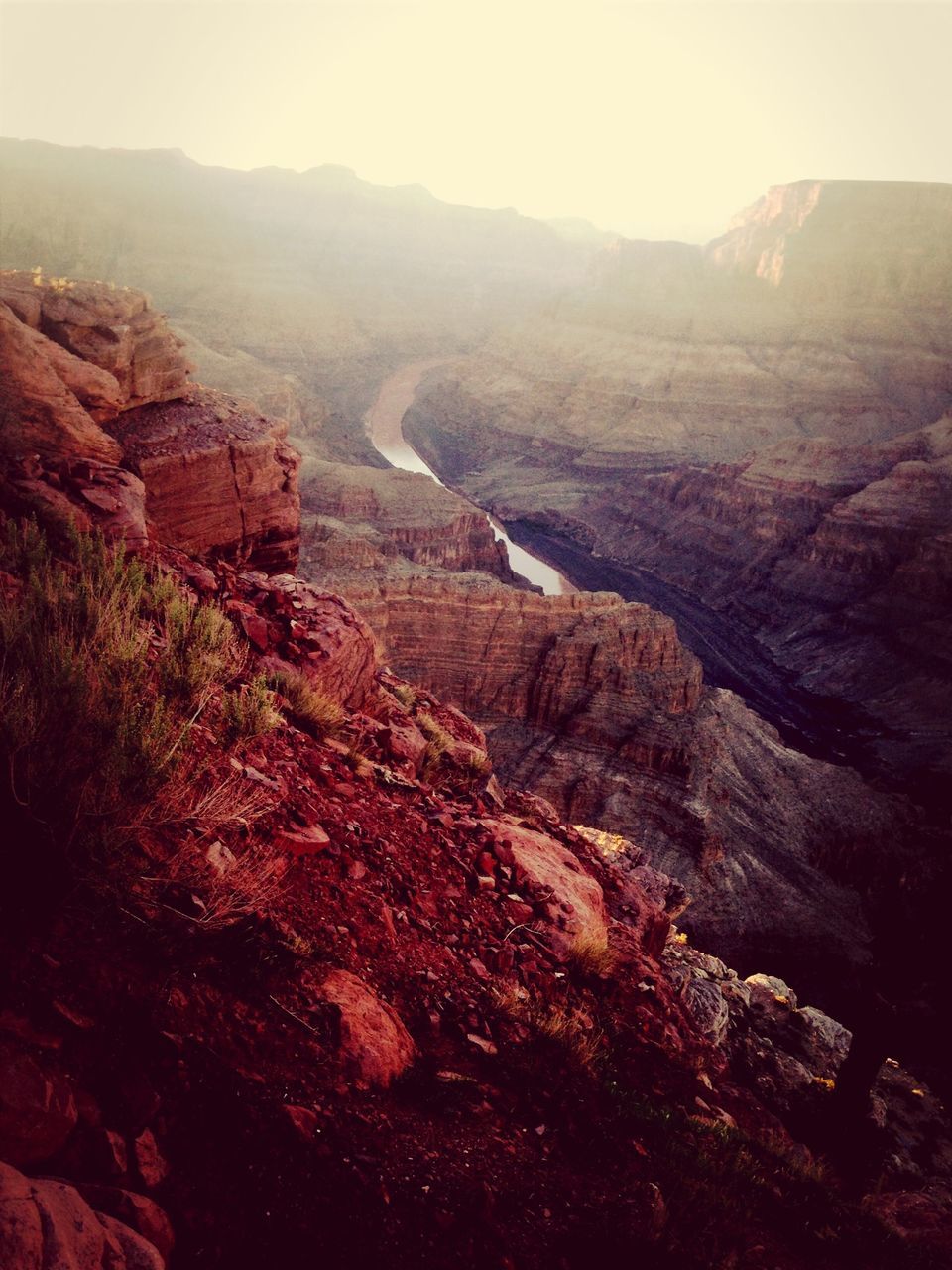 mountain, scenics, rock formation, rock - object, tranquility, landscape, tranquil scene, beauty in nature, physical geography, nature, geology, mountain range, high angle view, travel destinations, famous place, sky, sunlight, tourism, travel, non-urban scene