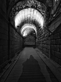 Empty corridor in tunnel