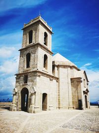 Low angle view of historic building against sky