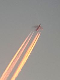 Airplane flying against sky