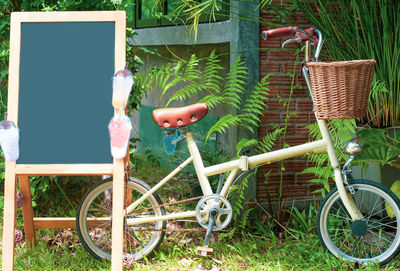 Bicycle in basket on field