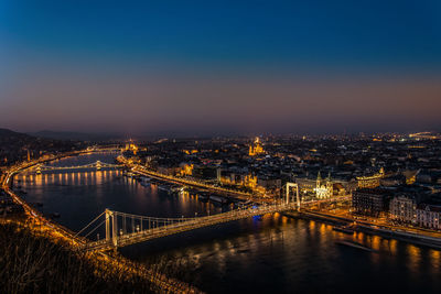 High angle view of illuminated bridge over river