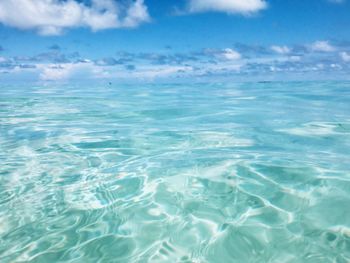 View of calm sea against cloudy sky