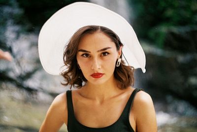 Portrait of woman wearing hat