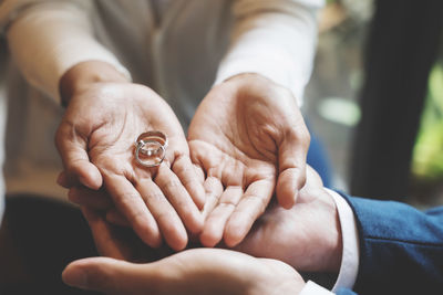 Close-up of hand holding hands