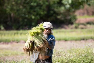 Man wearing mask on field