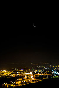 Aerial view of illuminated cityscape