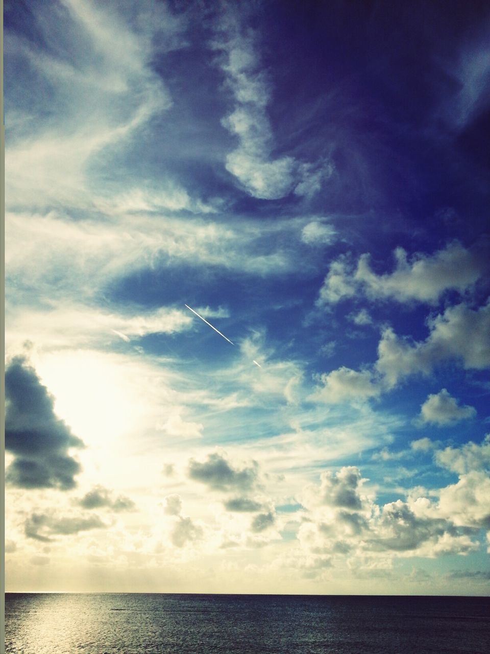 sea, horizon over water, tranquil scene, scenics, sky, beauty in nature, water, tranquility, nature, cloud - sky, idyllic, cloud, waterfront, blue, cloudy, seascape, outdoors, no people, remote, sunset