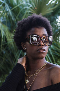 Portrait of woman wearing sunglasses