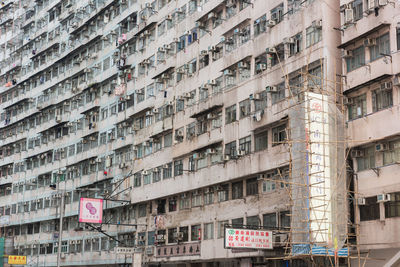 Low angle view of text on building