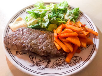 High angle view of food in plate on table