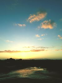 Scenic view of silhouette landscape against sky during sunset