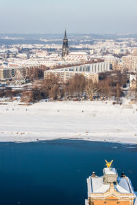 High angle view of cityscape by elbe river during winter