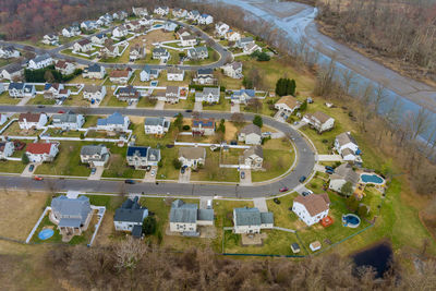 High angle view of cars on road amidst field