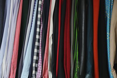 Full frame shot of shirts hanging in closet