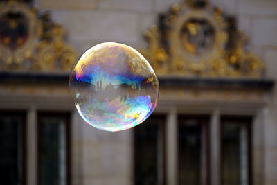Close-up of bubbles against building
