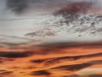 Low angle view of dramatic sky during sunset