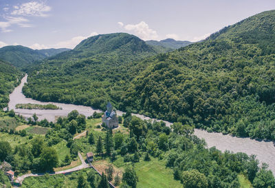 High angle view of trees and mountains against sky
