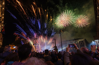 Firework display at night